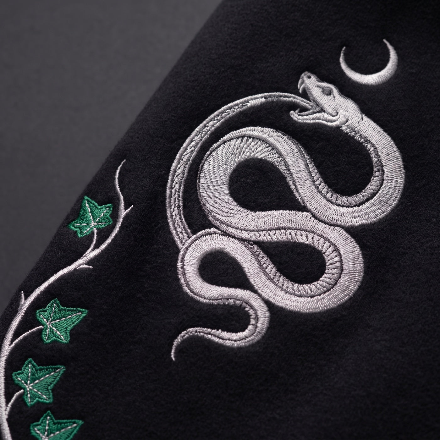 Close up of the satin stitch embroidery on brushed fleece